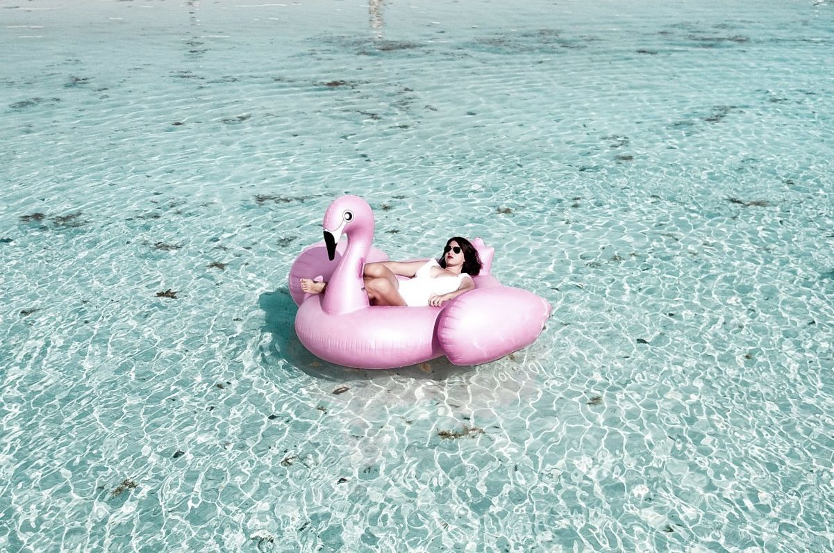 Woman on Inflatable Float Duck