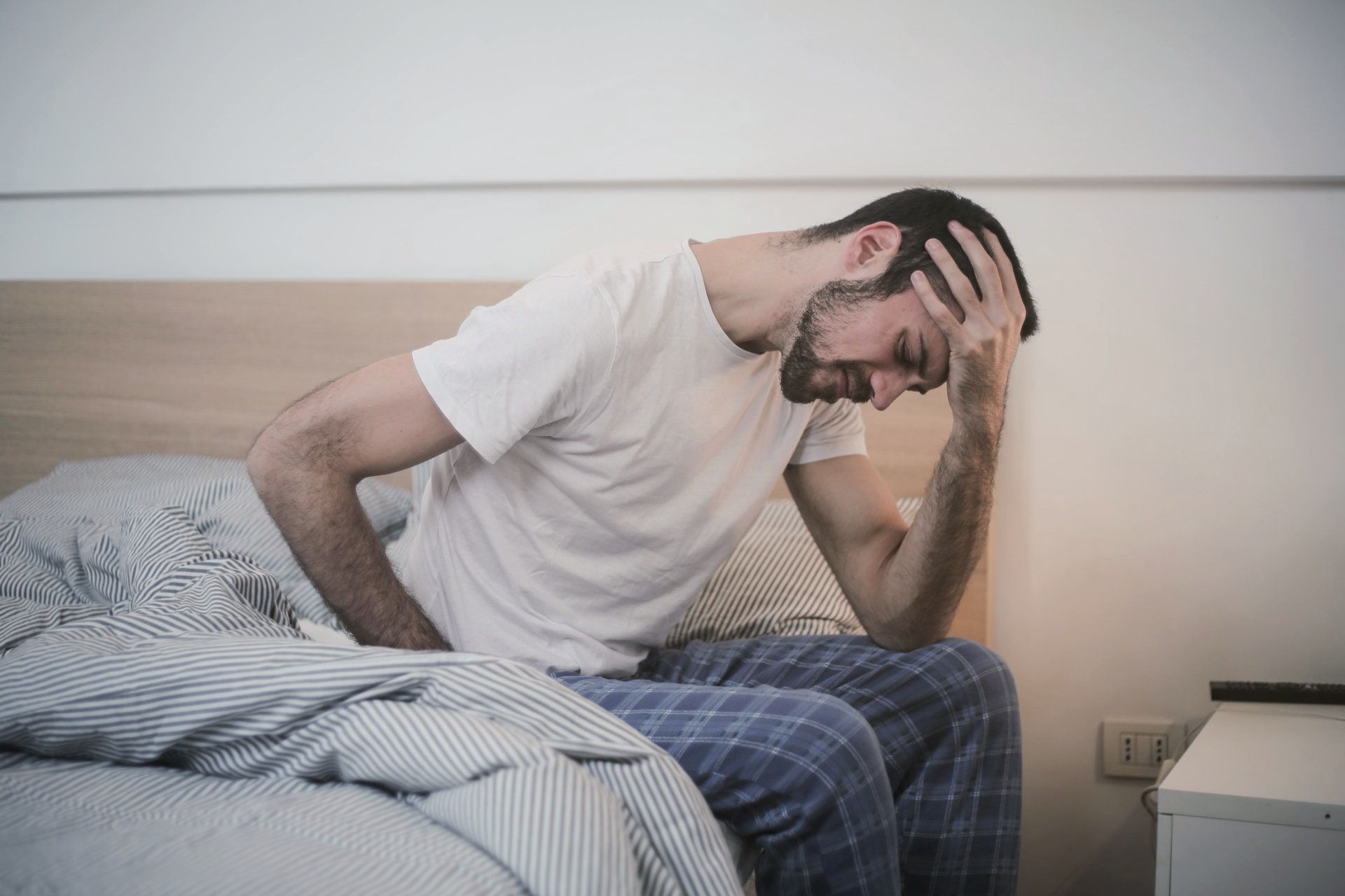 Man Suffering From Migraine