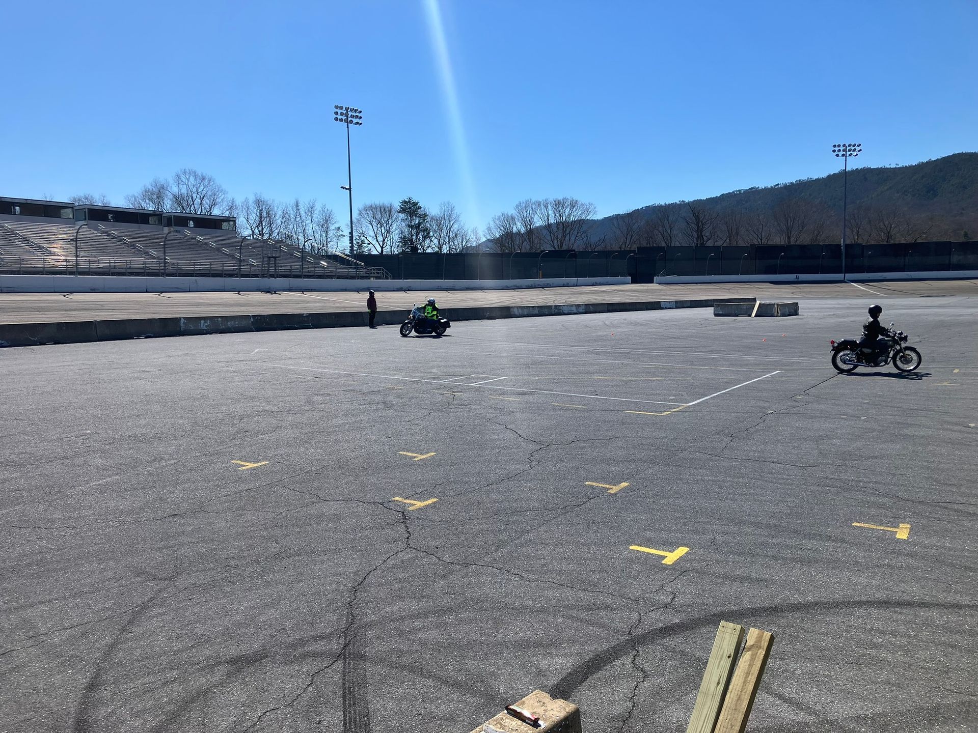 A person is riding a motorcycle on a track