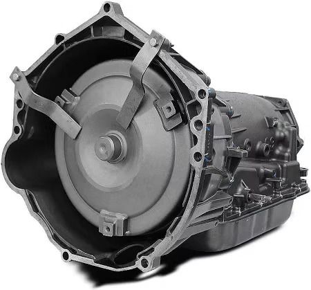 Automatic transmission, silver metal, with a torque converter and housing visible.