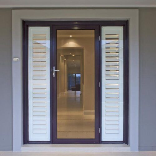 Modern Dark-framed Door With a Glass Center — Suburban Security Screens in Currumbin, QLD