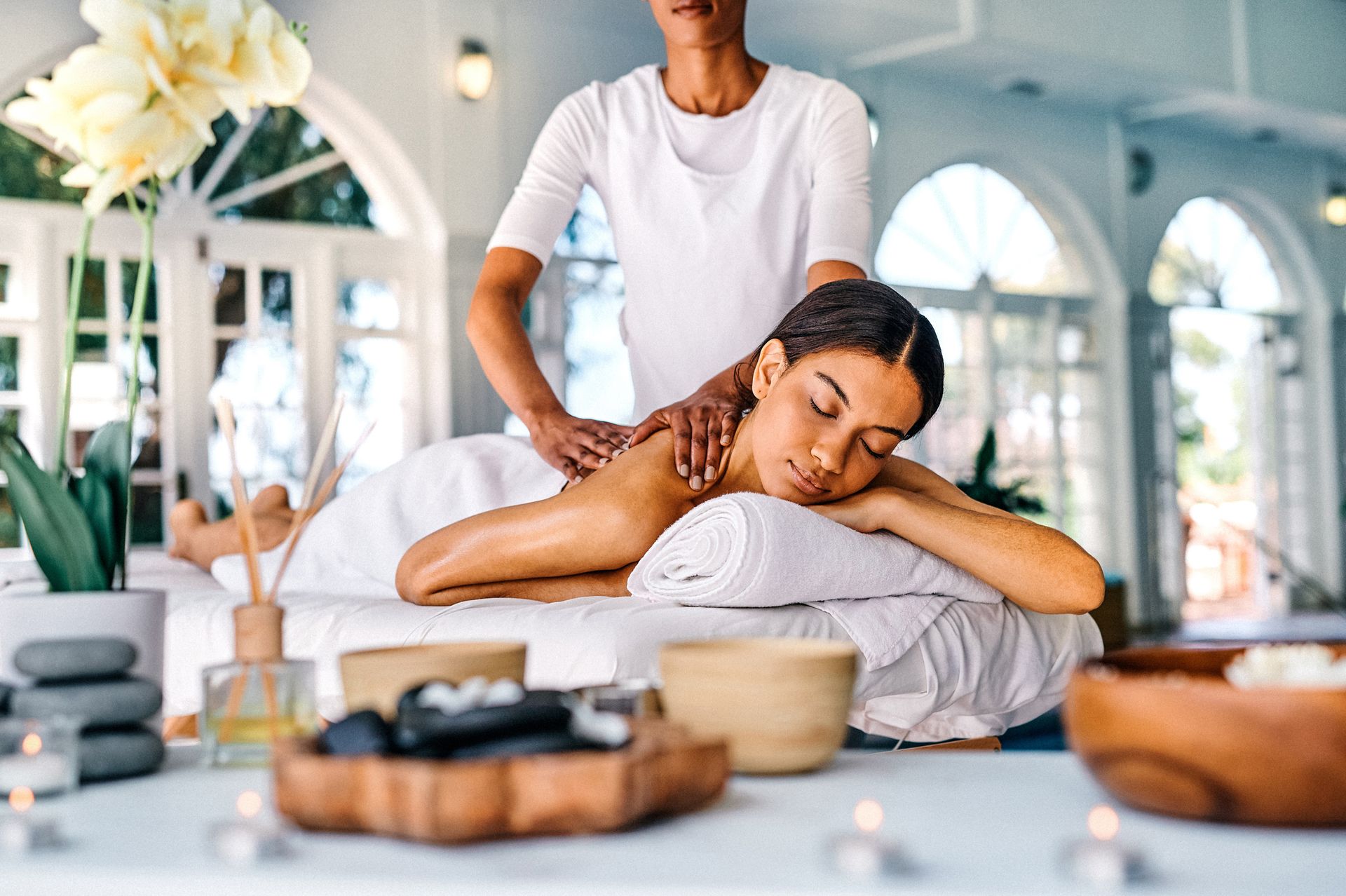 A woman is getting a massage at a spa.