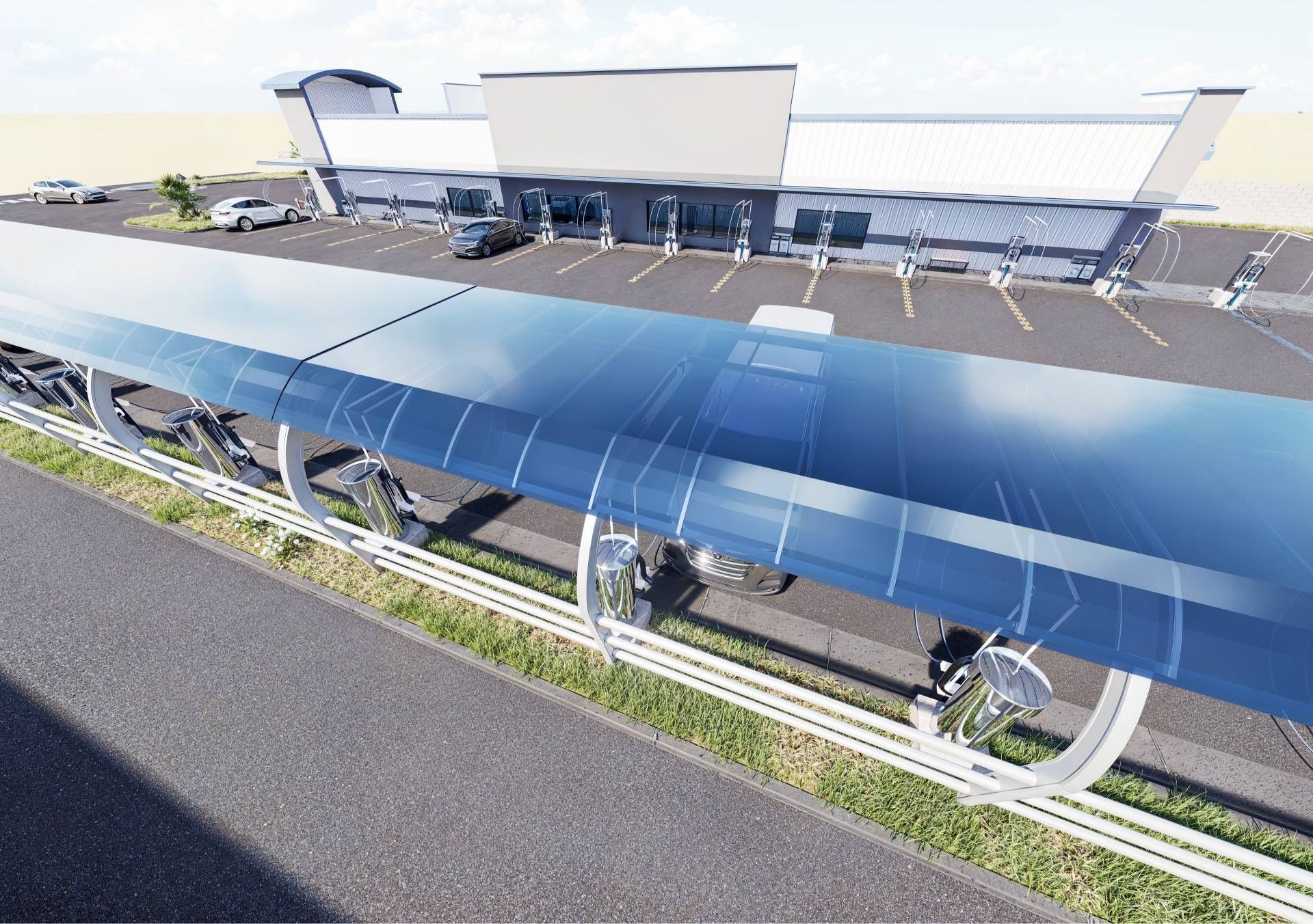 An aerial view of a large building with a blue canopy over it.
