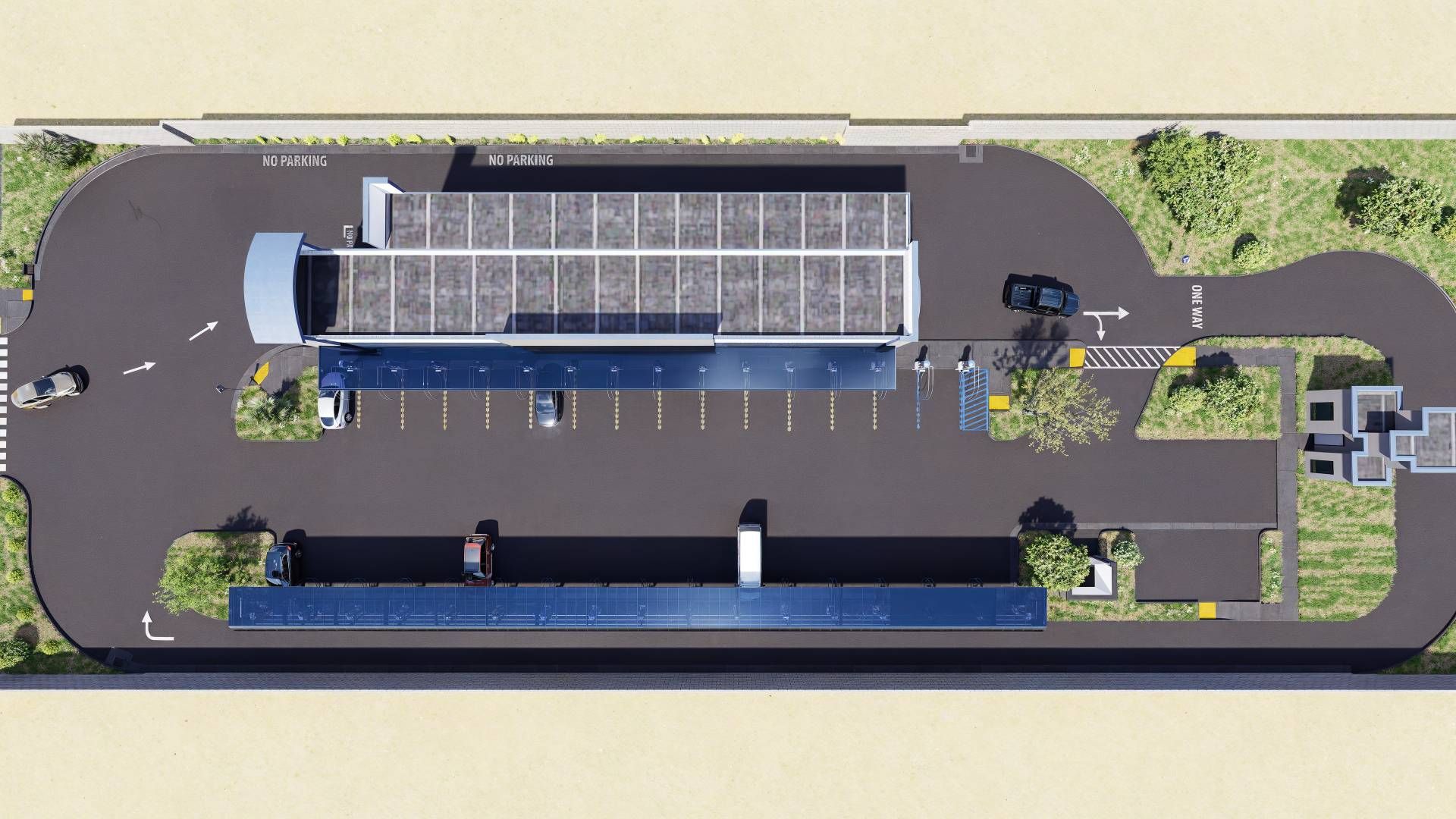 An aerial view of a parking lot with a building in the background.