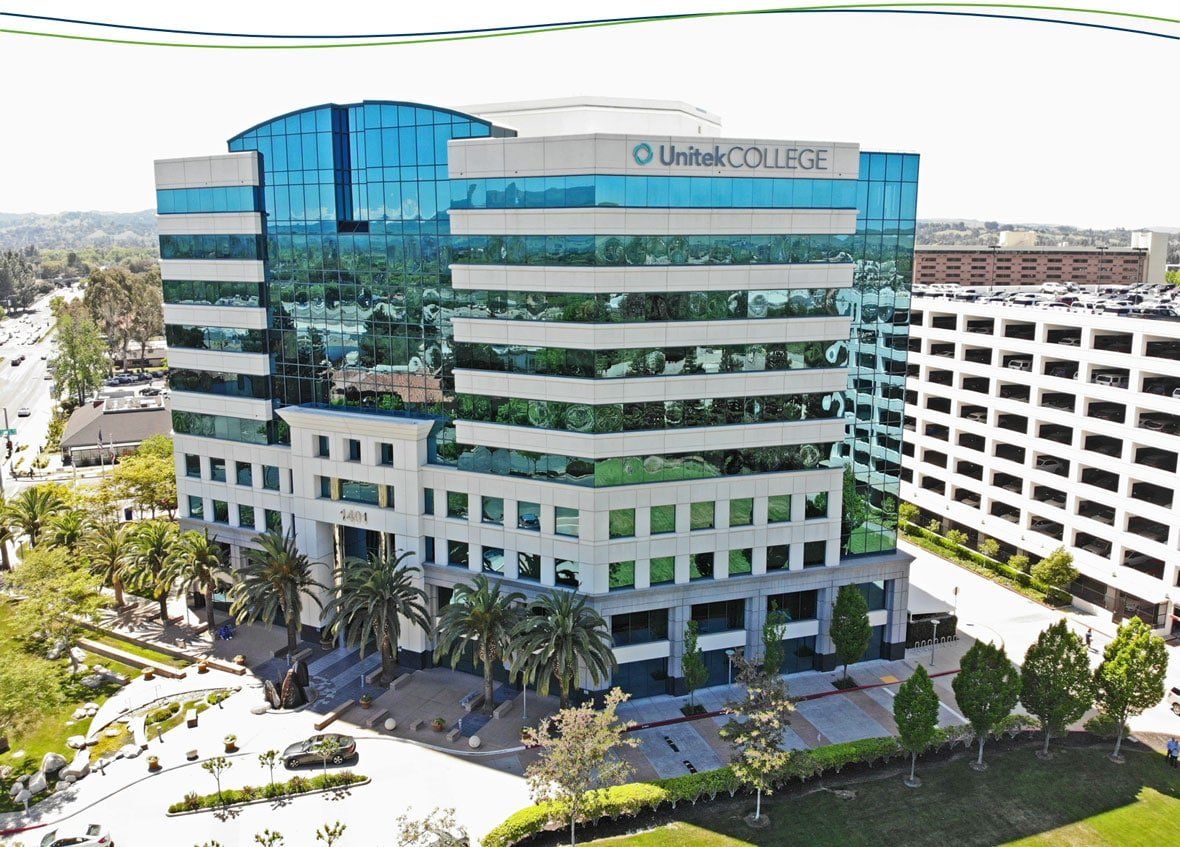 An aerial view of a large building with the word unisource on it