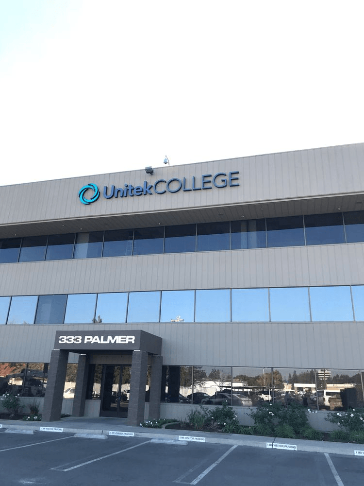 A large building with the word college on it