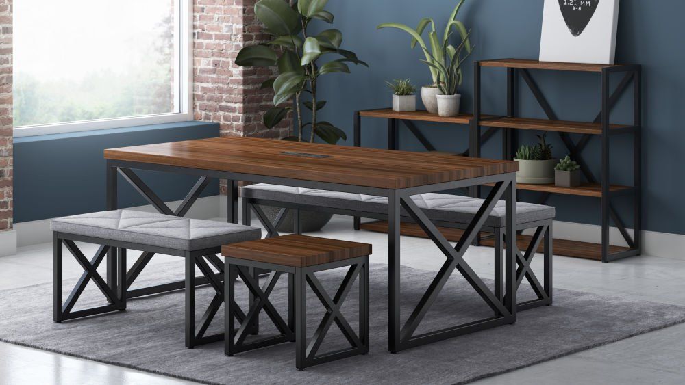 A dining room with a wooden table and benches.
