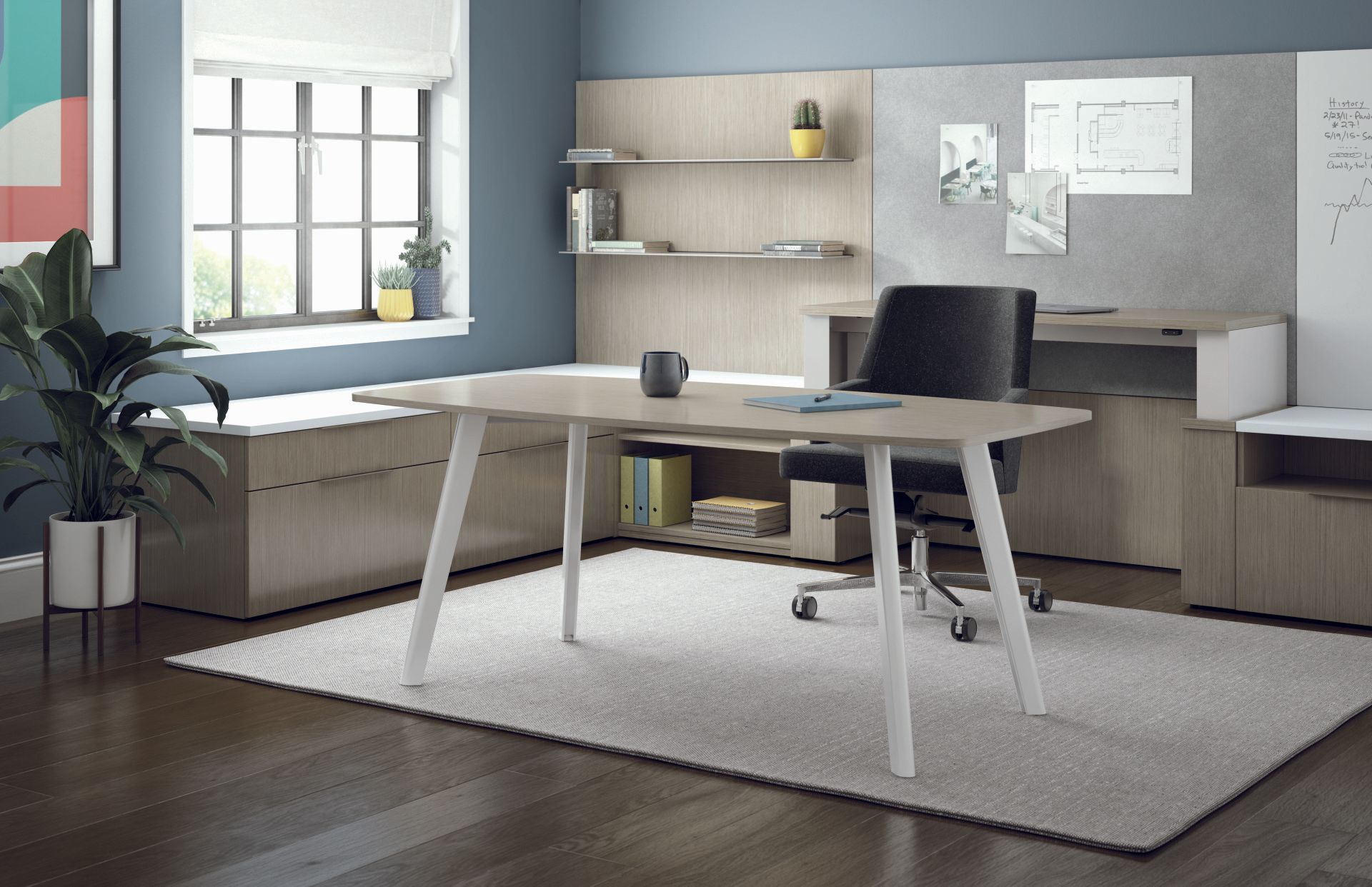 A room with a desk and a chair in it.