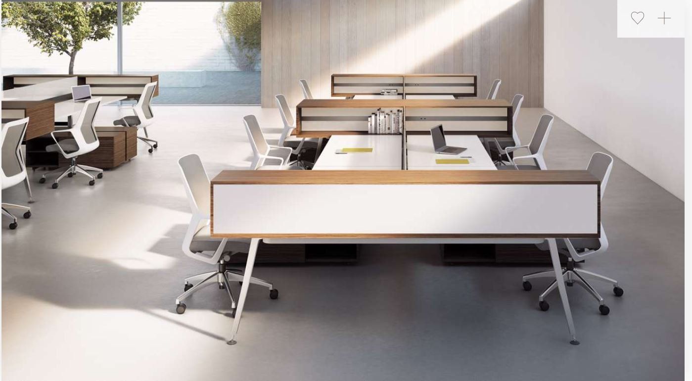 A room with a lot of tables and chairs in it