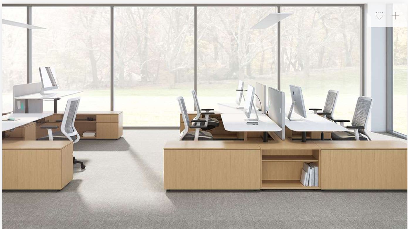 An office with a lot of windows and desks and chairs