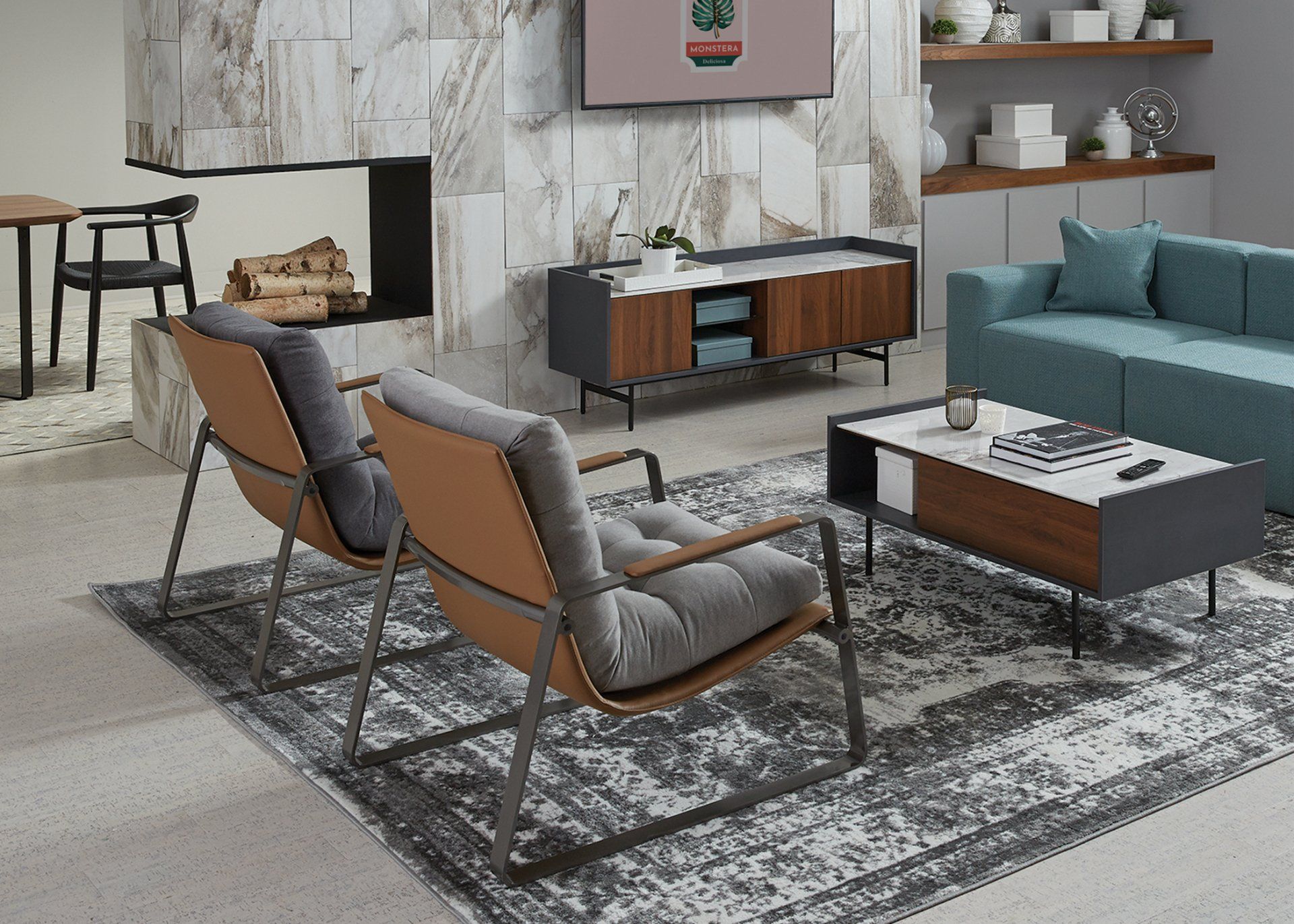 A living room with two chairs a couch and a coffee table