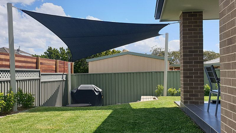 Backyard With Shade Sail — Professional Shade Sail Installations on the Central Coast, NSW