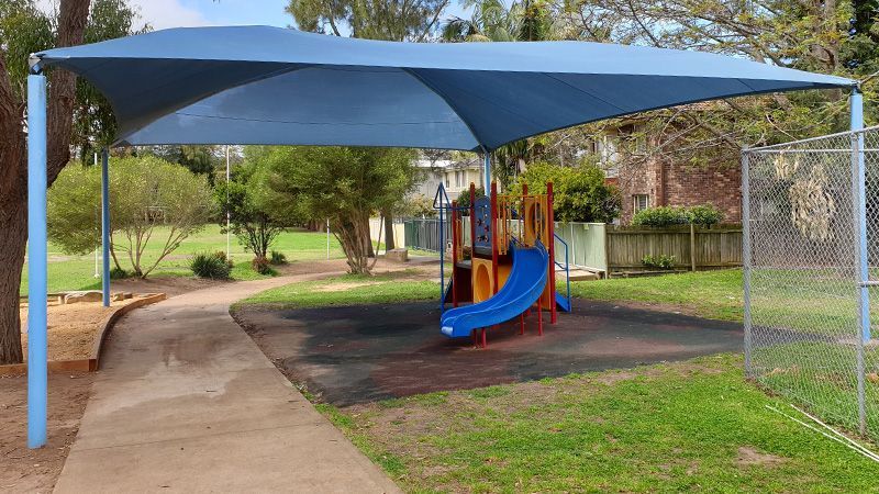 Blue Shade Sail Over Playground — Durable Shade Sail Material on the Central Coast, NSW