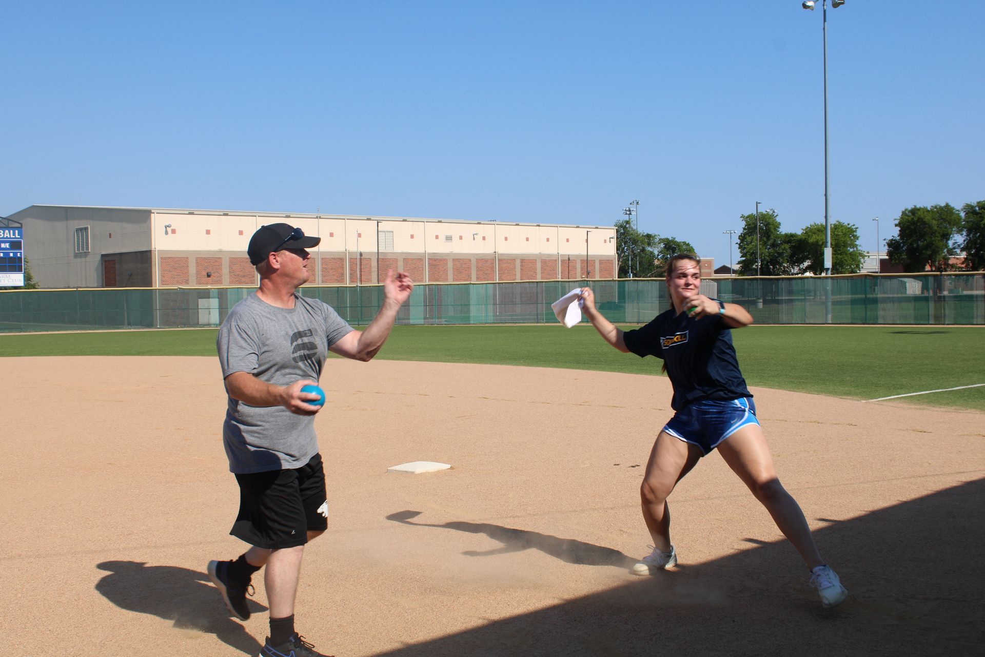 A group of young boys are playing soccer on a field.