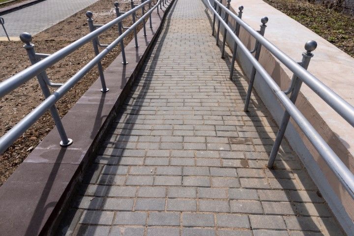 accessible park walkway in Brentwood with gray railings