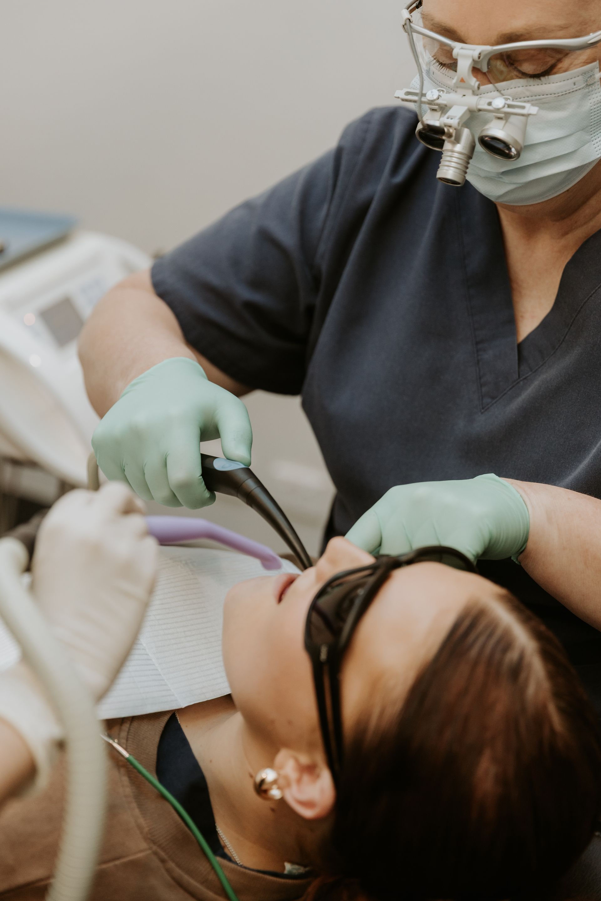 Dentist Performing Dental Work on a Patient — Dubbo Dental in Dubbo, NSW