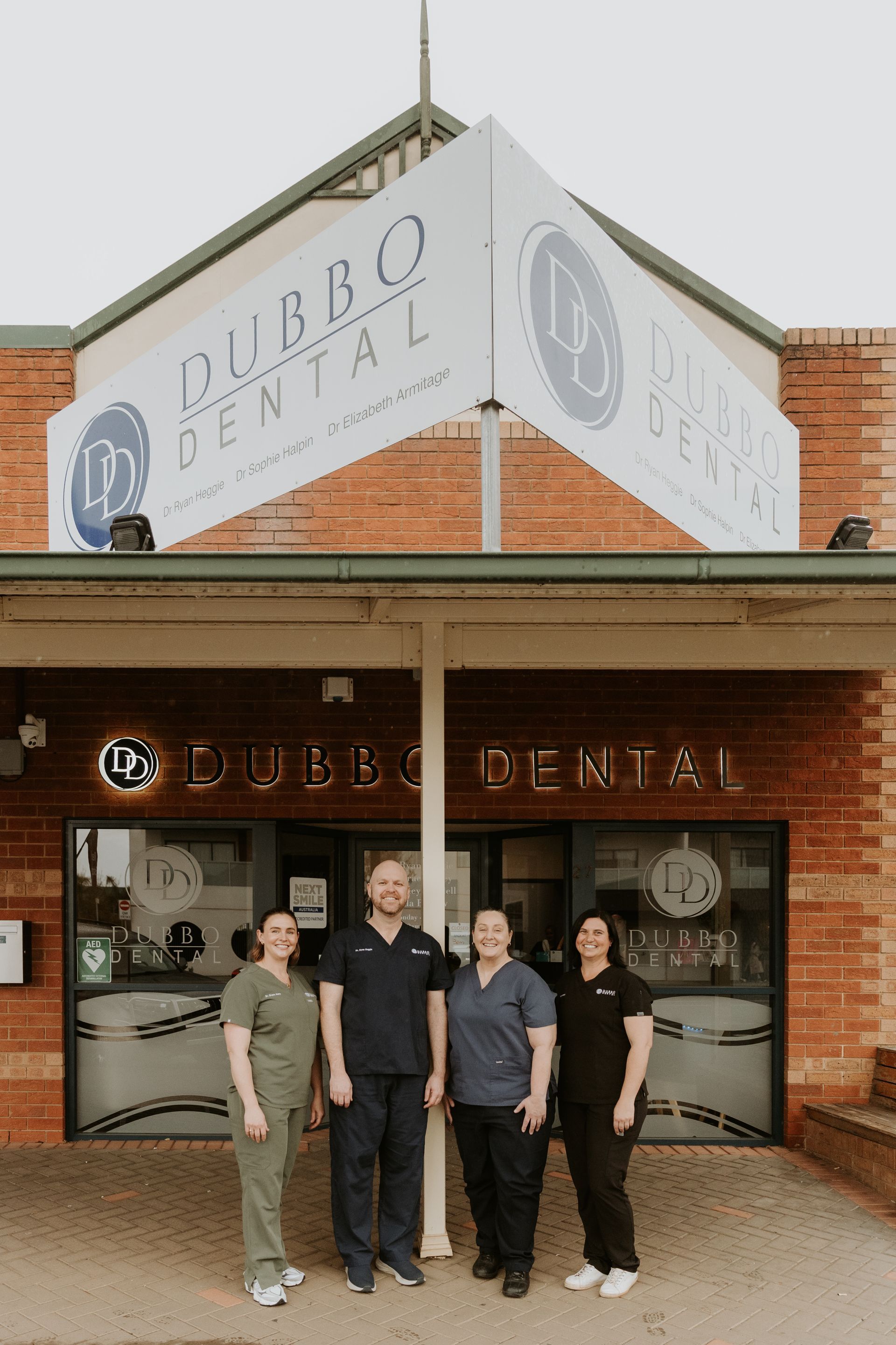 Four Women in Dental Scrubs Outside — Dubbo Dental in Dubbo, NSW