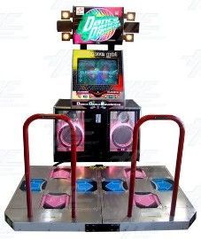 A dance machine is sitting on top of a dance floor.