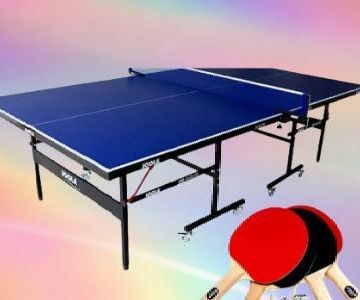 A blue ping pong table with two ping pong paddles on it.