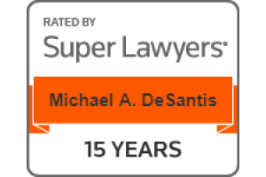 A sign that says rated by super lawyers michael a. de santis 15 years