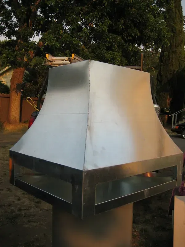 Stainless Steel Hood Is Sitting on The Ground in Front of Trees | Santa Rosa, CA | Morris Heating and Sheet Metal