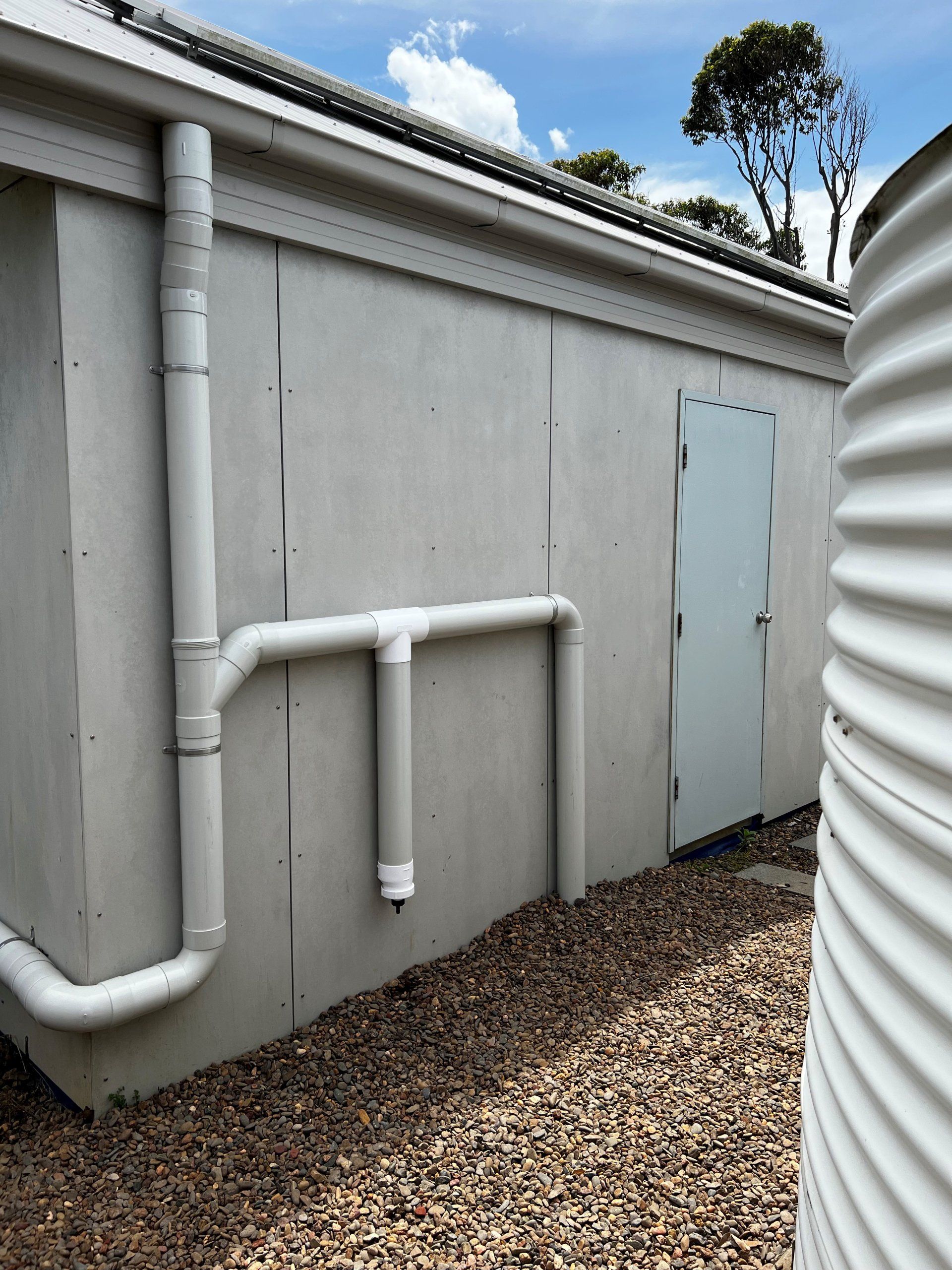concrete building with pipes