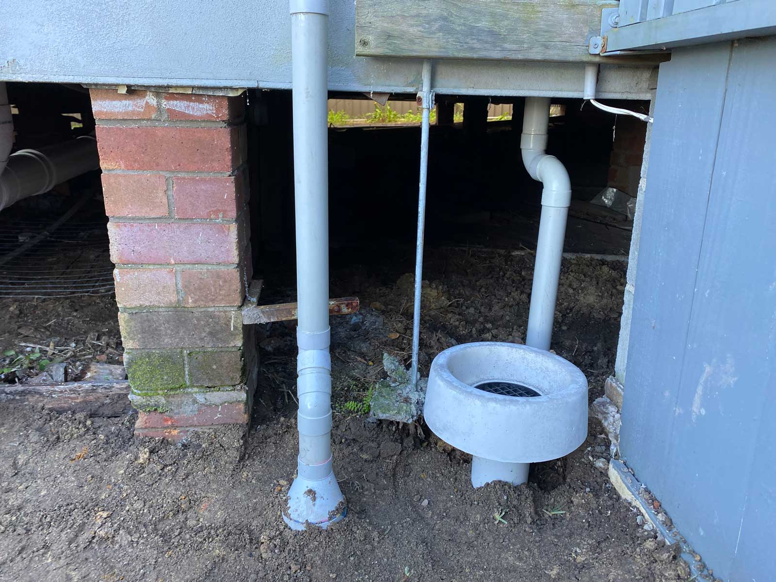 building without white pipes exposed