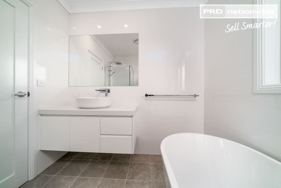 Bathroom Renovation With Cabinets And Sink — Jones Building Group In Inverness, QLD