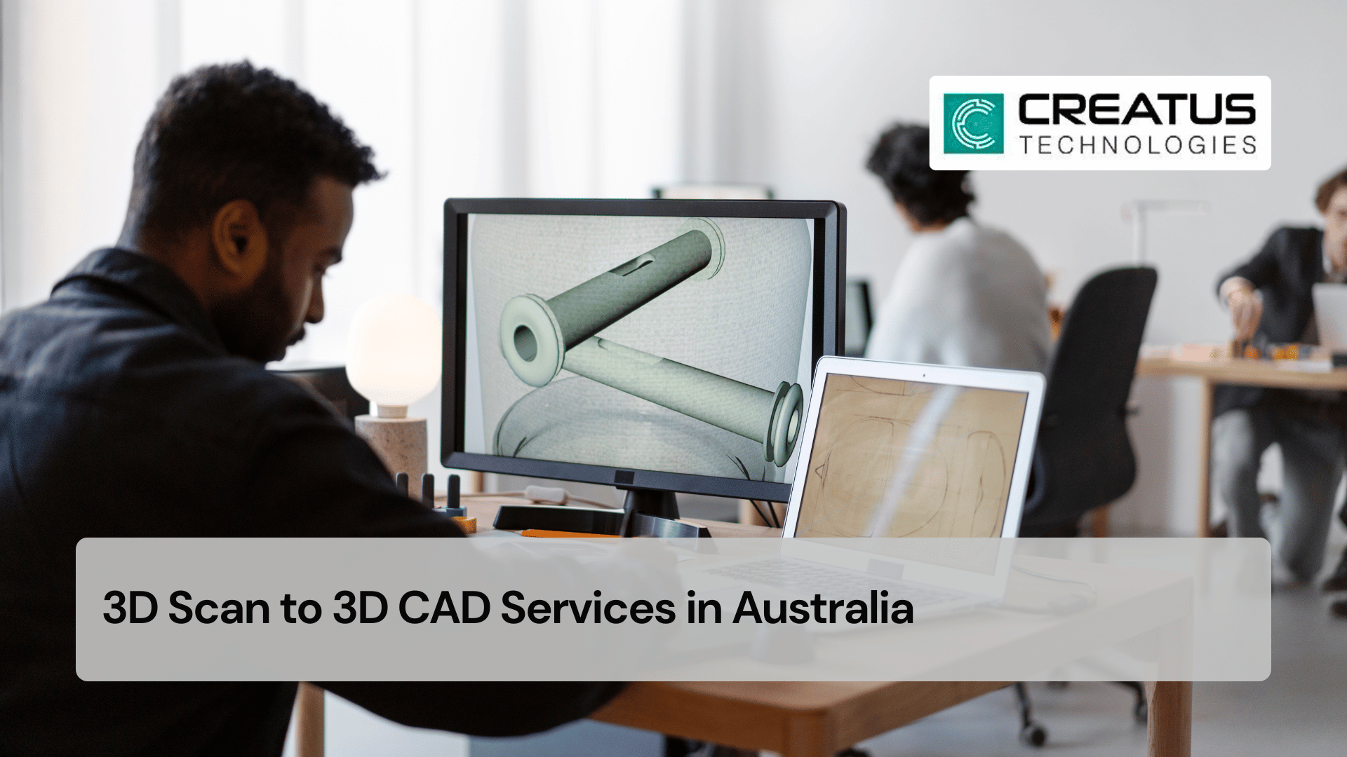 Engineer reviewing 3D scan data and reconstructed CAD model on workstation in industrial environment