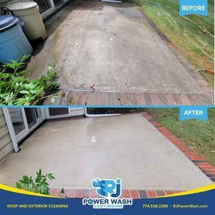 Man using a pressure washer to clean and rejuvenate concrete surface.