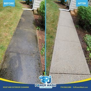 A pressure washer in action, cleaning a concrete pathway, removing dirt, grime, and stains effectively.