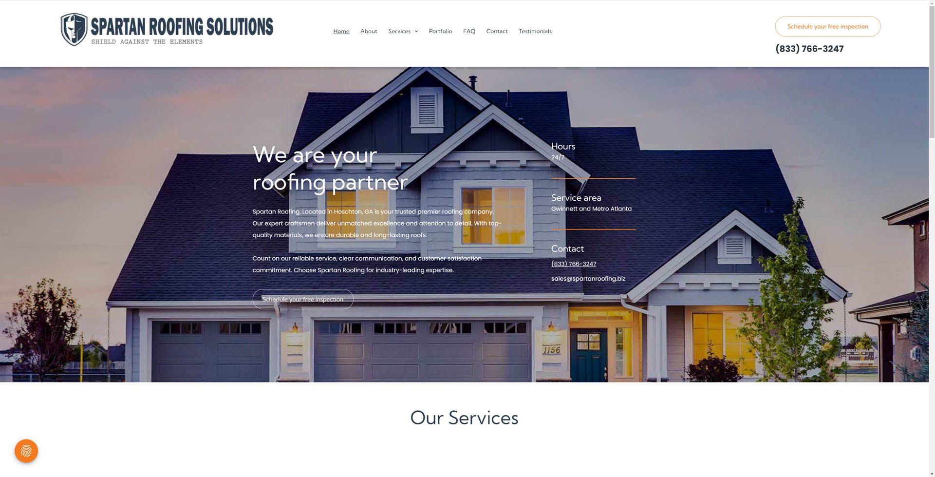 A large house with a blue roof is on a website.