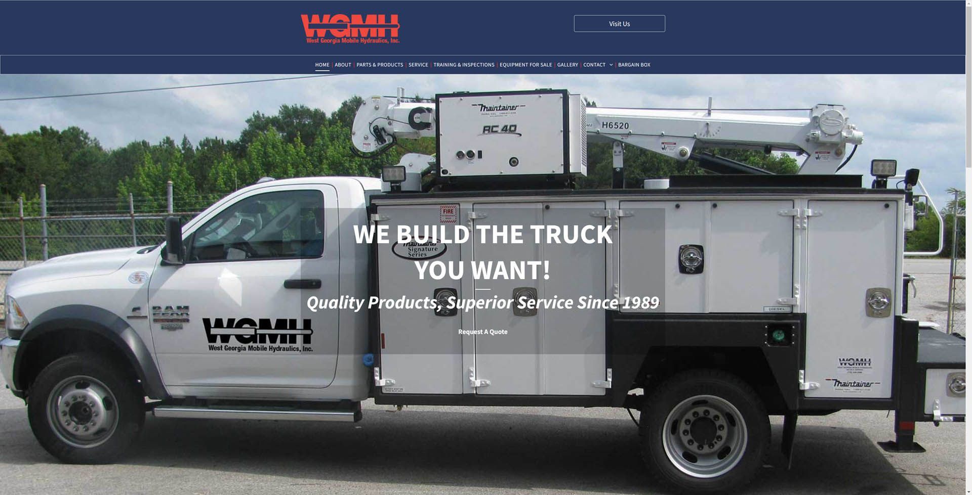A white truck with the words we build the truck you want on the side