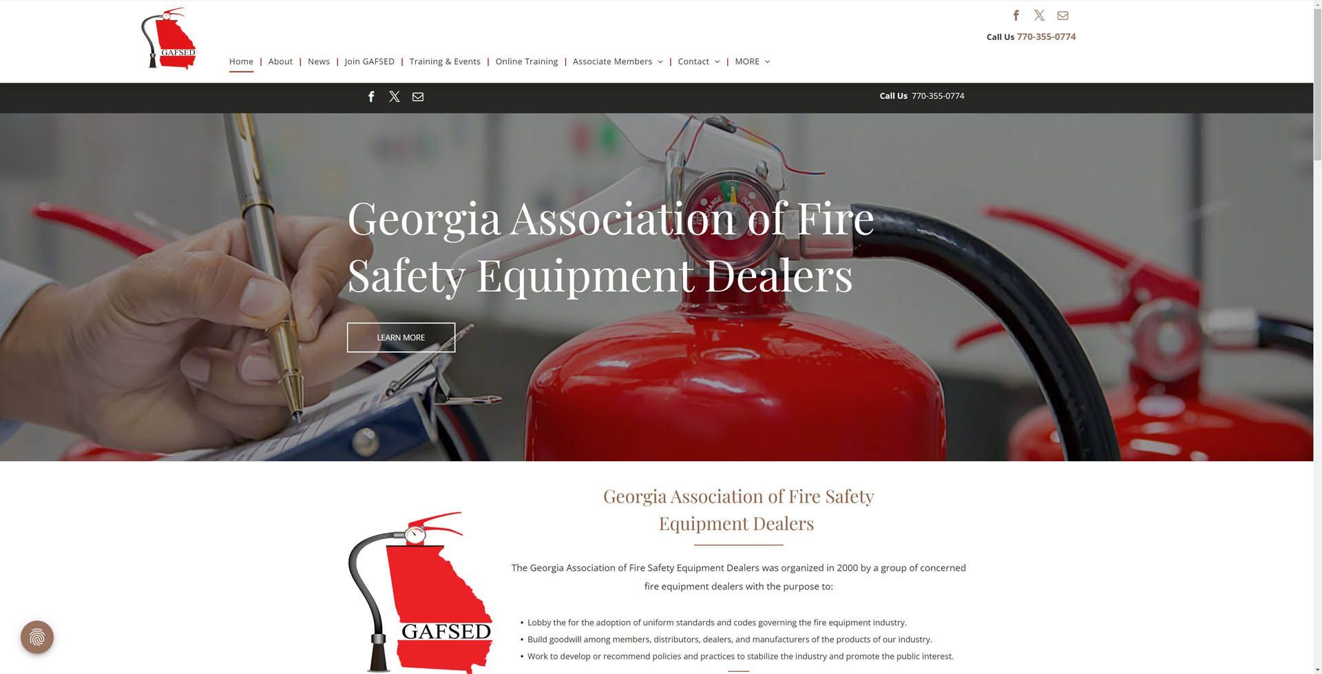 The georgia association of fire safety equipment dealers website shows a person holding a fire extinguisher.