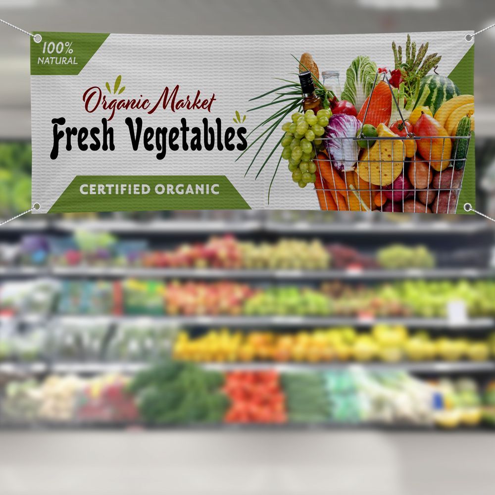 A banner in a grocery store advertising fresh vegetables.