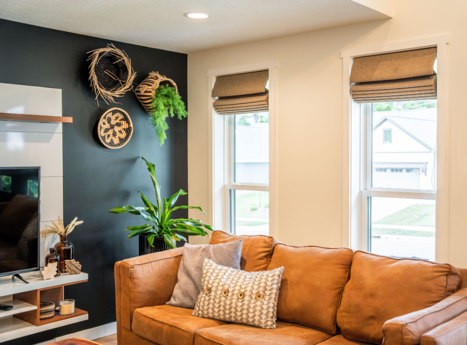 An empty room with lots of windows and a door