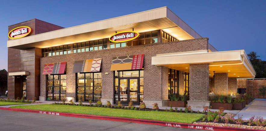 A large building with a lot of windows and a sign that says jack in the box