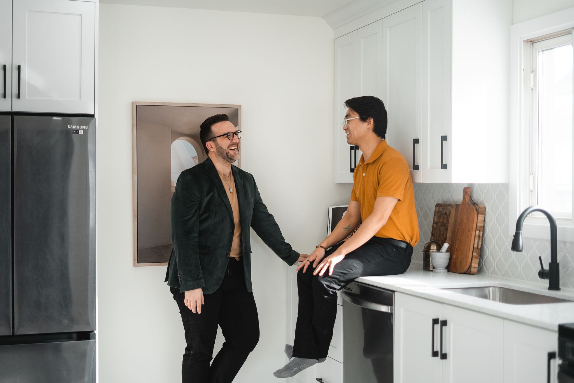 Jonathan Berube and Kevin Ma speaking in rent to own home Windsor Ontario 