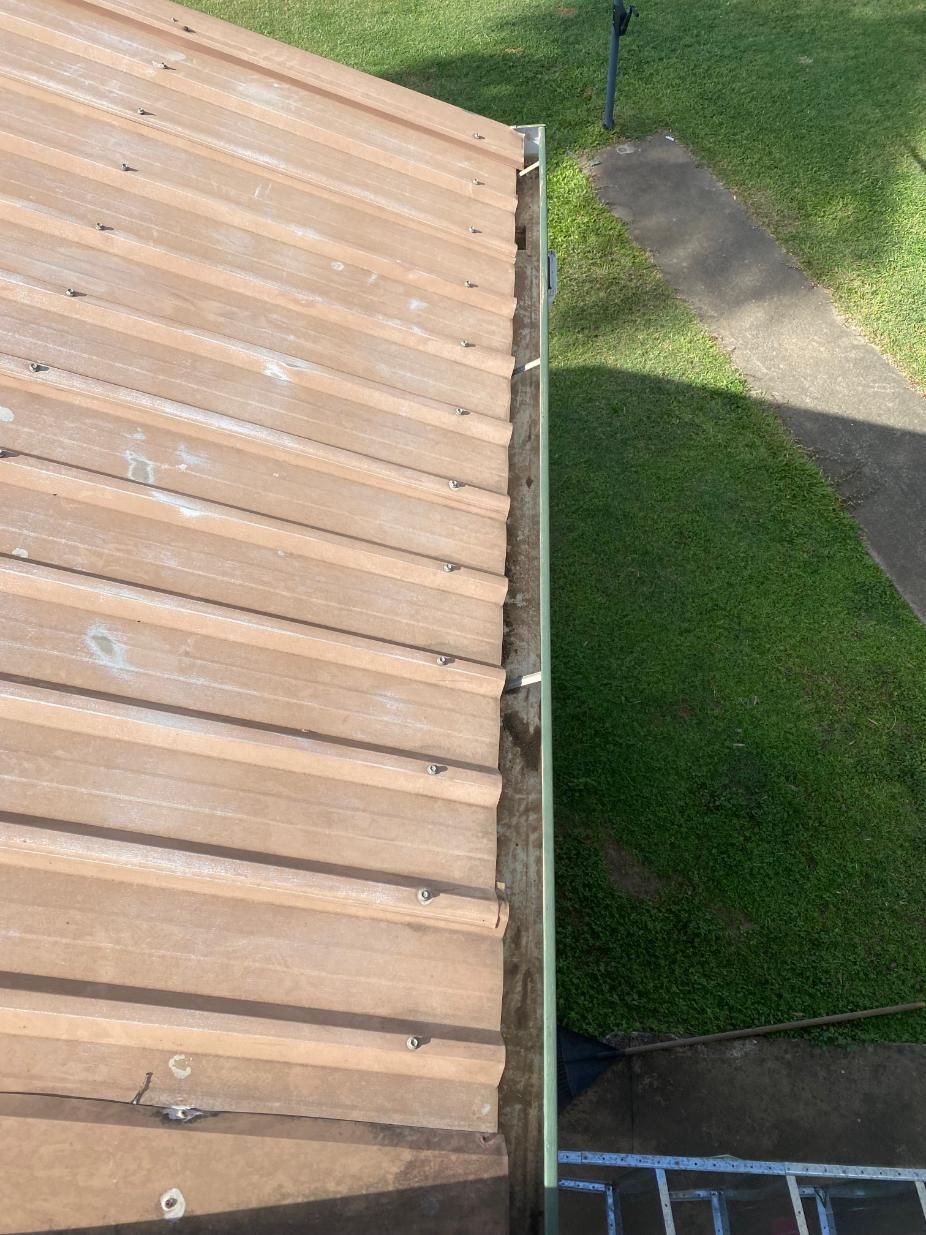 Wooden Roof With a Metal Gutter to It — CPR Exterior Cleaning in Innes Park, QLD
