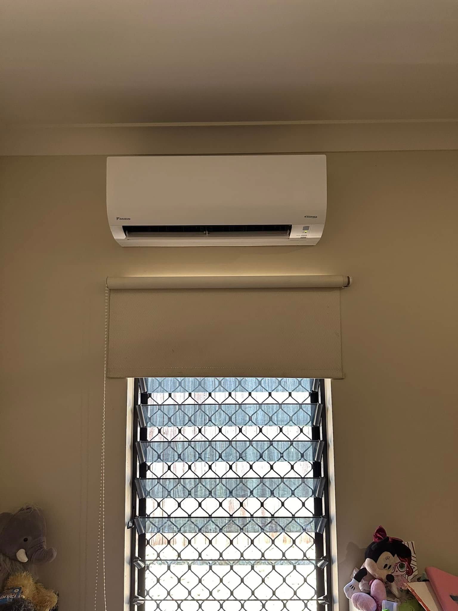 A Room With a Window and a Air Conditioner — Eclipse Air Conditioning and Refrigeration in Trinity Beach, QLD