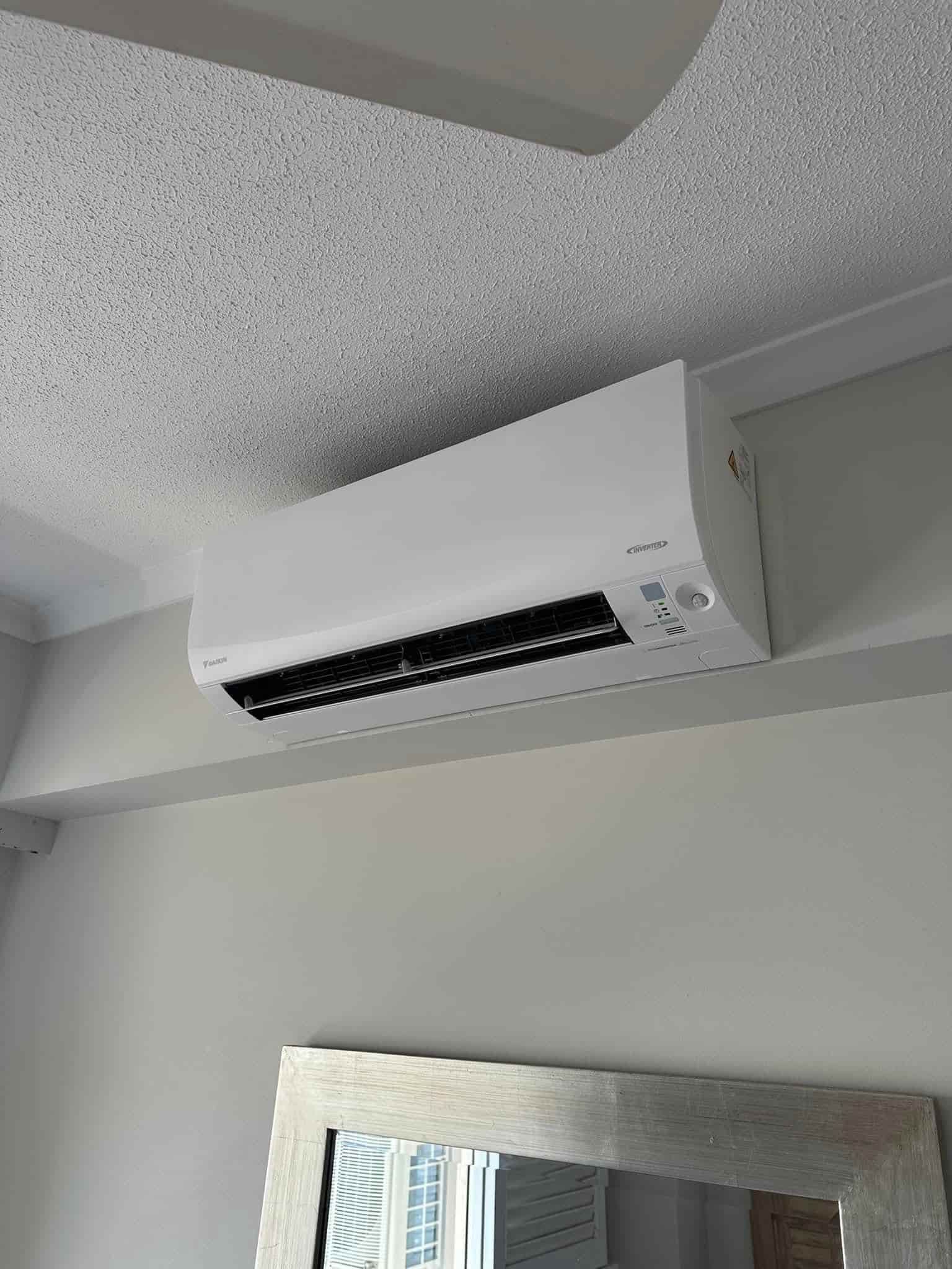 Air Conditioner Mounted on a Wall — Eclipse Air Conditioning and Refrigeration in Trinity Beach, QLD
