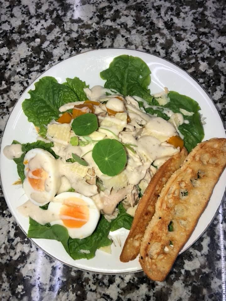A Plate of Food with Eggs and Garlic Bread on A Table — Fiori With Love in Ingham, QLD