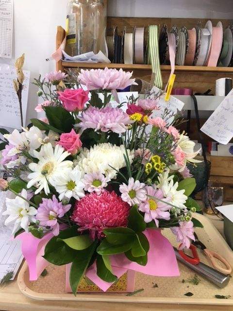 A Bouquet of Pink and White Flowers on A Table — Fiori With Love in Ingham, QLD