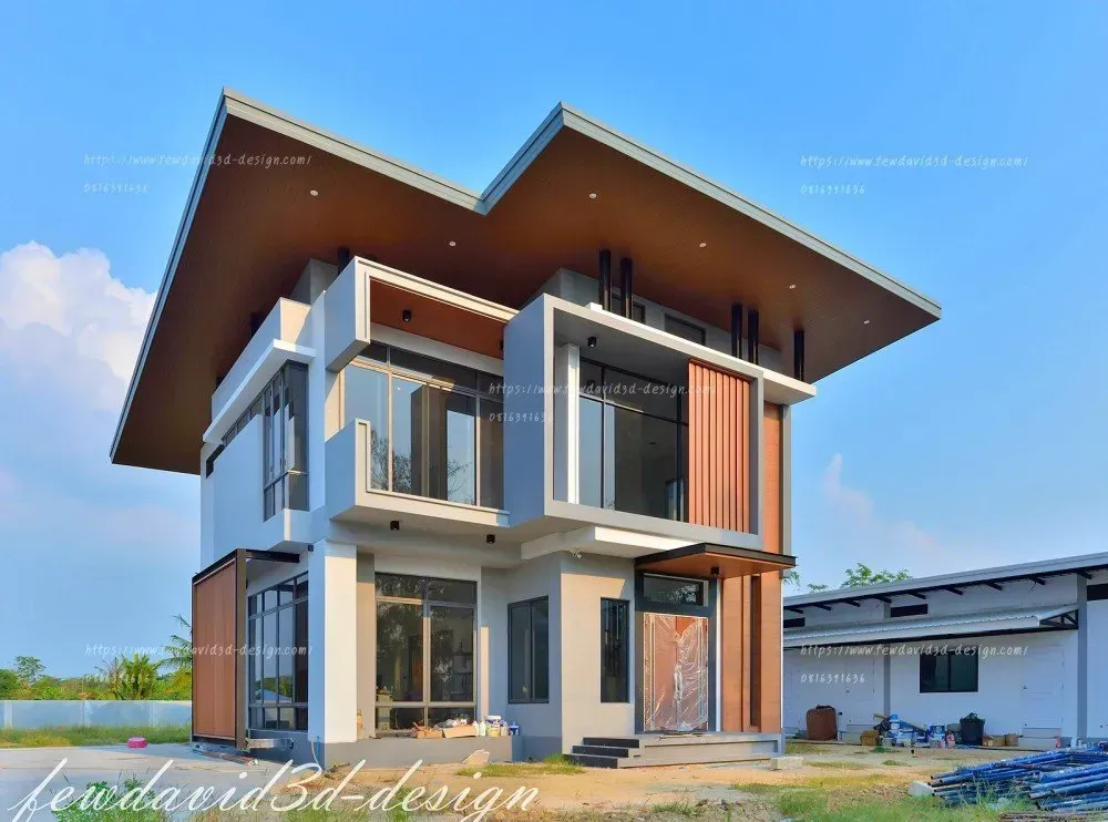 บ้านโมเดิร์นสองชั้น หลังคาเพิงหมาแหงน ดีไซน์ล้ำสมัย เน้นกระจกบานใหญ่เปิดรับแสงธรรมชาติ ผสานโครงสร้างสีขาว-เทากับระแนงไม้แนวตั้ง เพิ่มความอบอุ่นและความหรูหรา พื้นที่โปร่งโล่ง เหมาะสำหรับครอบครัวที่ต้องการบ้านทันสมัยและมีเอกลักษณ์ รับออกแบบบ้านโมเดิร์นโดยมืออาชีพ