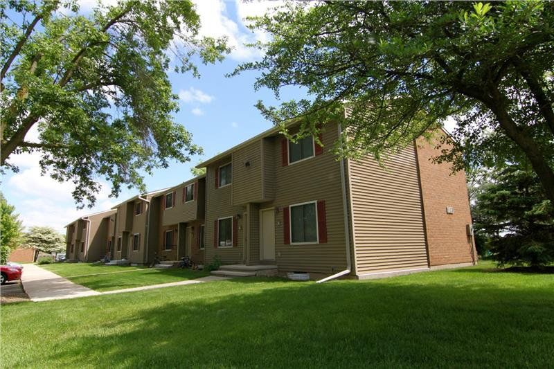 An exterior view of the Rustic Woods Town Homes