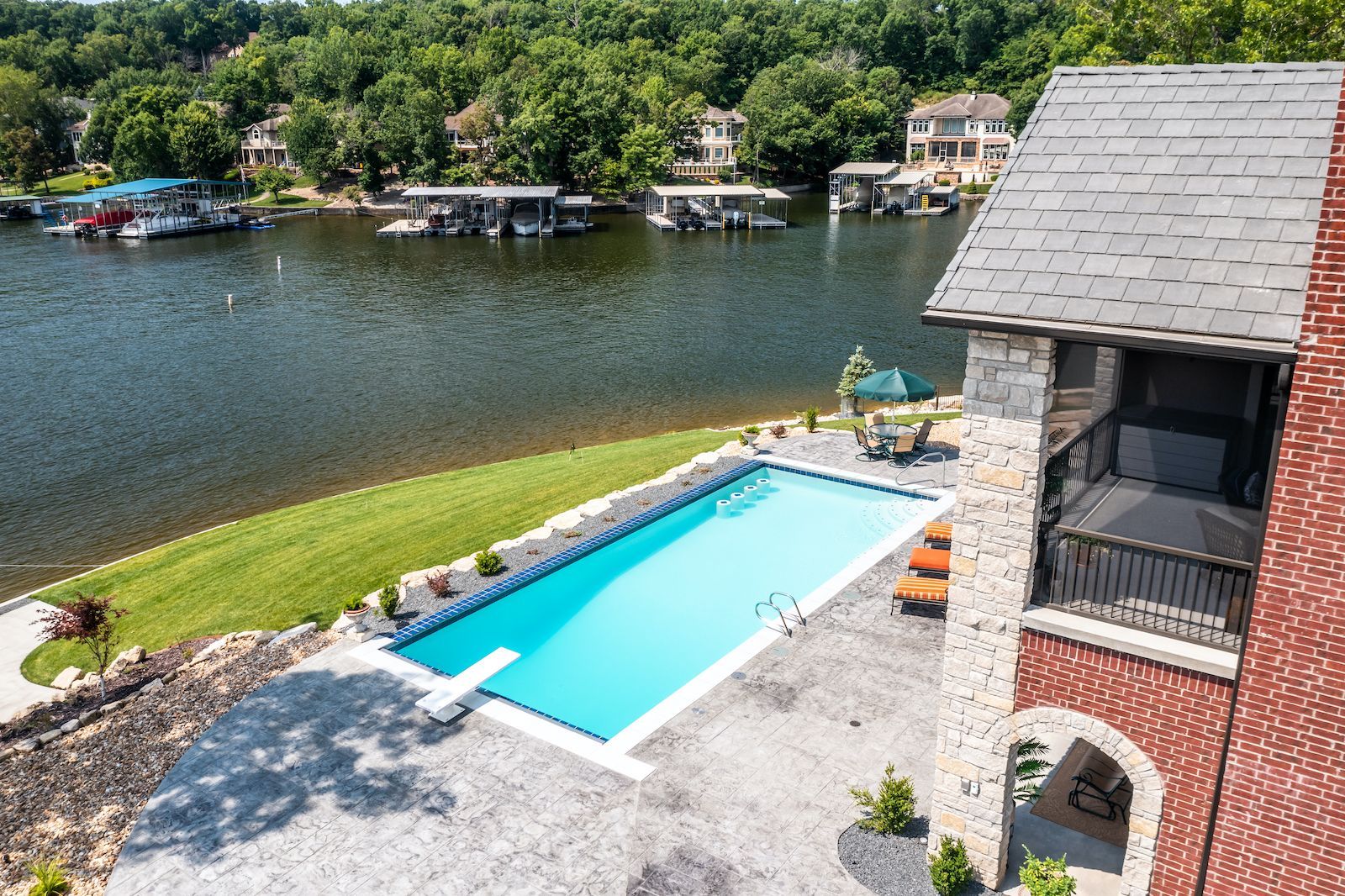 Custom Pool Design With Waterfall. Build a Pool in Lake Ozark, MO With Columbia Pool & Spa.