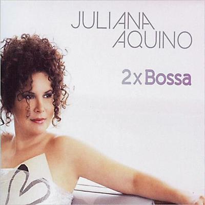 Uma mulher de cabelos cacheados é capa do disco 2x bossa de Juliana Aquino