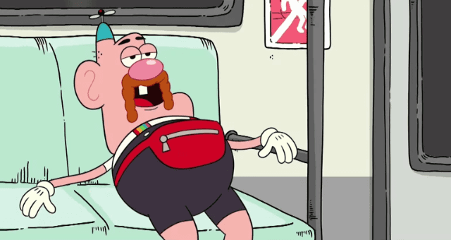 Um personagem de desenho animado está deitado em um sofá em um trem.