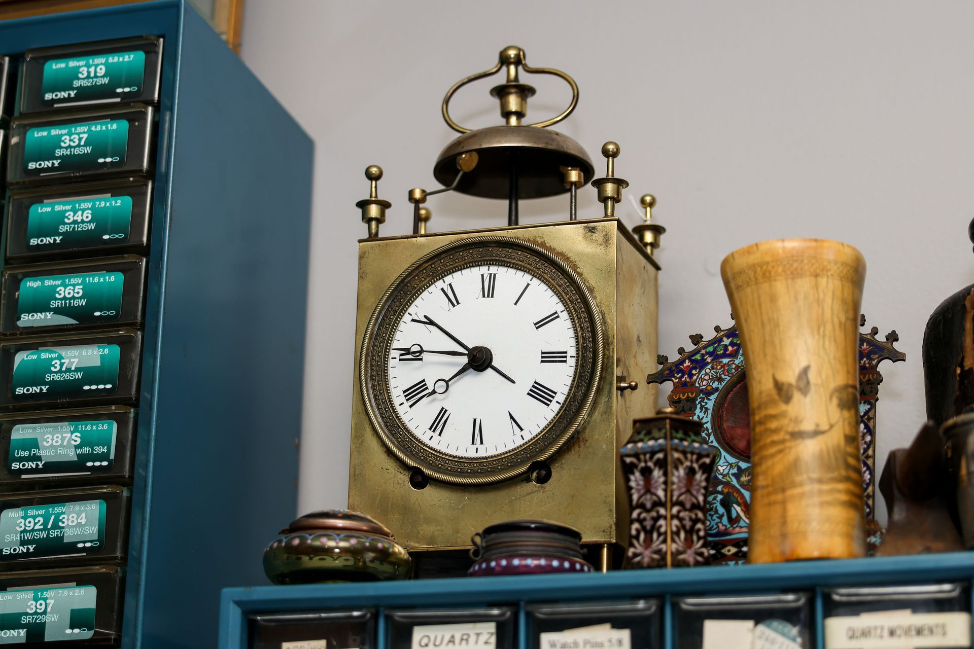 Old and broken jewelry, vintage watches on dark background. Sell gold for cash concept.