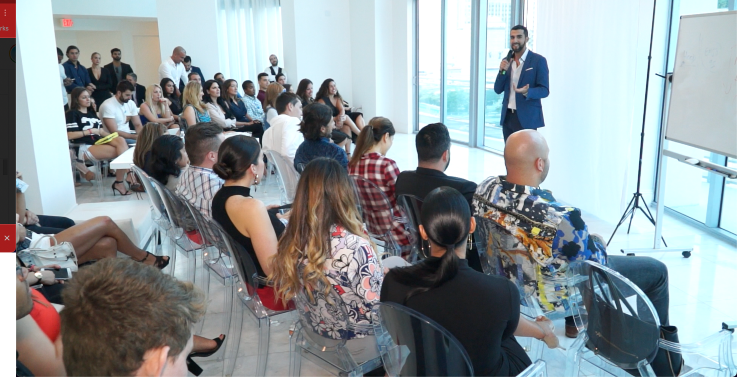 Andres Ospina speaking at an event in Miami.